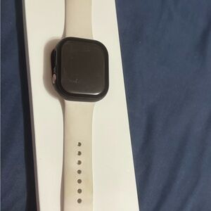 Apple Watch with Black Case and Cream Silicone Band
